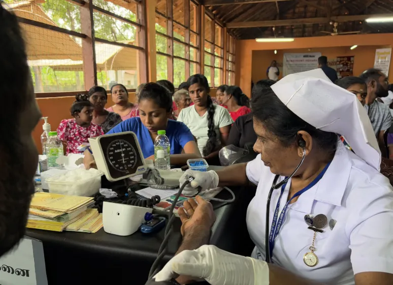 Nurse measuring a patient’s blood pressure